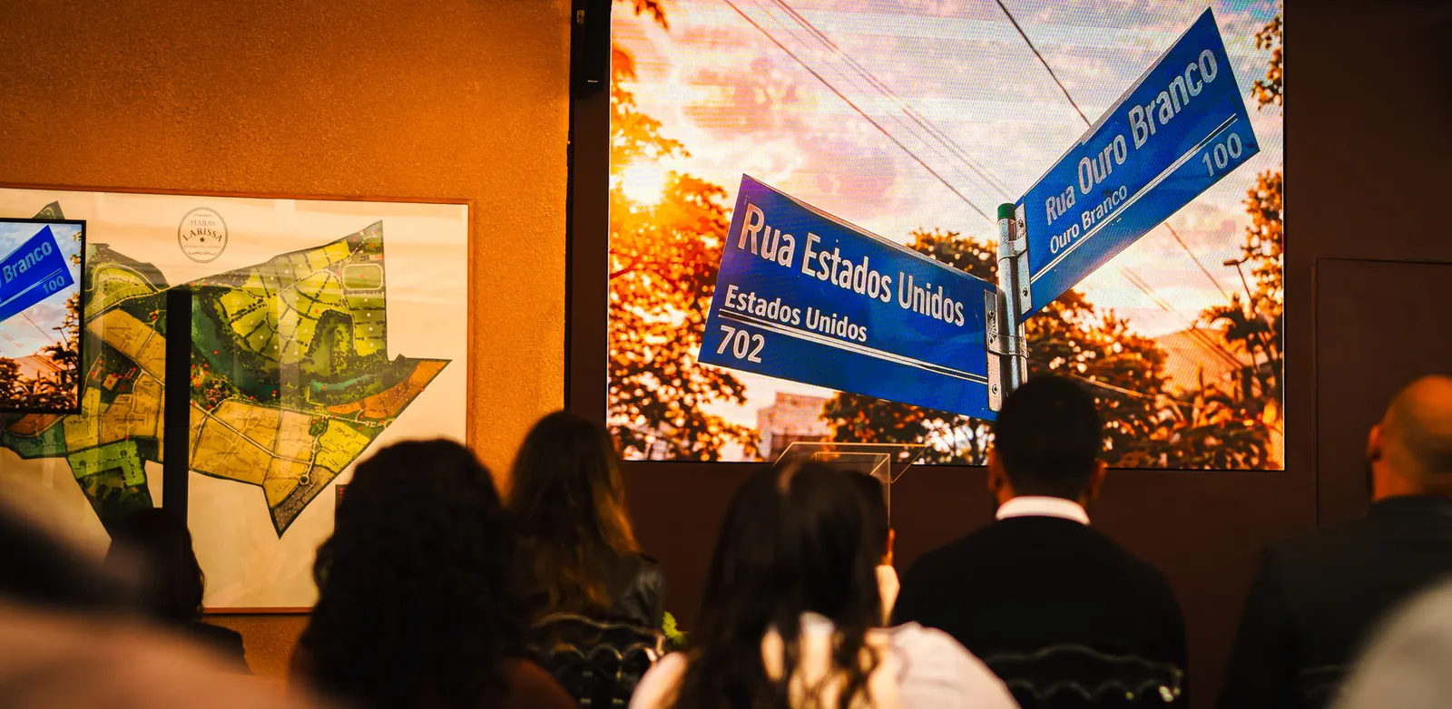 Tela do evento exibindo a identidade do empreendimento 702 Estados Unidos